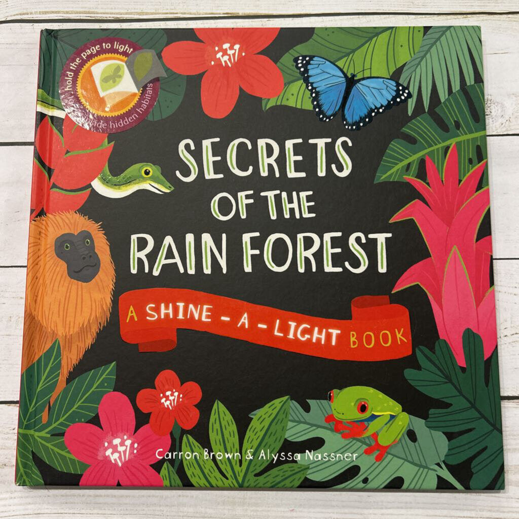 Used Book - Secrets of the Rain Forest Shine a Light Book